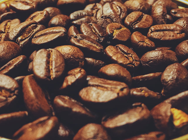 A selection of roasted coffee beans ready to be ground.